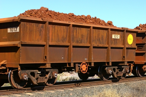 1013 060716 7196
Robe River ore waggon 1013, built by Bradken Rail Qld, December 2005, fixed coupler end handbrake side loaded view at the 71 km on the Deepdale line, Western Creek, July 16, 2006.
Keywords: 1013;Bradken-Rail-Qld;Robe-ore-waggon;