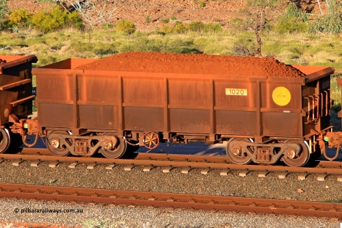 1020 110602 1646
Robe River ore waggon 1020, built by Bradken Rail Qld in January 2006, rotary coupler end handbrake side loaded view at the 71 km, Western Creek on the Deepdale line. June 2, 2011.
Keywords: 1020;Bradken-Rail-Qld;Robe-ore-waggon;