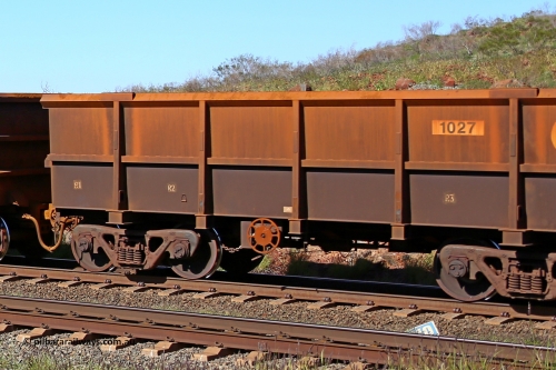 1027 160727 0960
Robe River ore waggon 1027, built by Bradken Rail Qld in January 2006, rotary coupler end handbrake side empty partial view at Harding Siding on the Cape Lambert line, July 27, 2016.
Keywords: 1027;Bradken-Rail-Qld;Robe-ore-waggon;