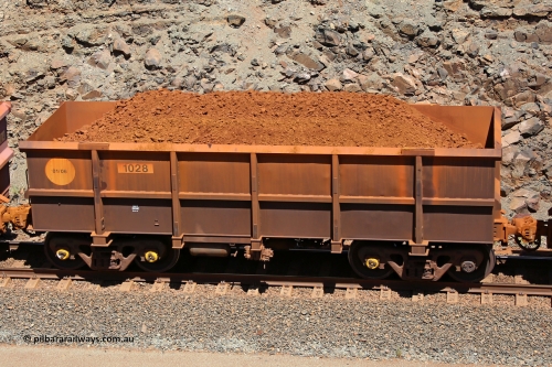 1028 160306 1561
Robe River ore waggon 1028, built by Bradken Rail Qld in January 2006, fixed coupler non-handbrake side loaded view, at the 45 km, Harding Siding on the Cape Lambert line. March 6, 2016.
Keywords: 1028;Bradken-Rail-Qld;Robe-ore-waggon;