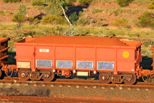 1031 110602 1662
Robe River ore waggon 1031, built by Bradken Rail Qld in September 2008, rotary coupler end handbrake side loaded view, instrumented vehicle, at the 71 km, Western Creek on the Deepdale line. June 2, 2011.
Keywords: 1031;Bradken-Rail-Qld;Robe-ore-waggon;