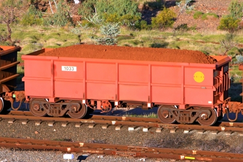 1033 110602 1624
Robe River ore waggon 1033, built by Bradken Rail Qld in September 2008, rotary coupler end handbrake side loaded view at the 71 km, Western Creek on the Deepdale line. June 2, 2011.
Keywords: 1033;Bradken-Rail-Qld;Robe-ore-waggon;