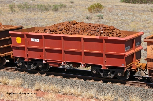1035 081209 0165
Robe River ore waggon 1035, built by Bradken Rail Qld in September 2008, fixed coupler non-handbrake side loaded view at the 7 km location just south of Cape Lambert yard. December 9, 2008.
Keywords: 1035;Bradken-Rail-Qld;Robe-ore-waggon;