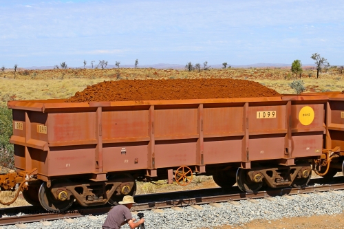 1099 170729 0261
Robe River ore waggon 1099, built by Bradken Rail Qld in March 2012, fixed coupler handbrake side loaded view at the 103 km, between Maitland Siding and the Fortescue River on the Deepdale line. July 29, 2017.
Keywords: 1099;Bradken-Rail-Qld;Robe-ore-waggon;