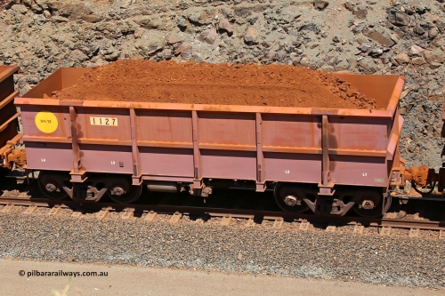 1127 160306 1630
Robe River ore waggon 1127, built by Bradken Rail Qld in March 2012, fixed coupler non-handbrake side loaded view, at the 45 km, Harding Siding on the Cape Lambert line. March 6, 2016.
Keywords: 1127;Bradken-Rail-Qld;Robe-ore-waggon;