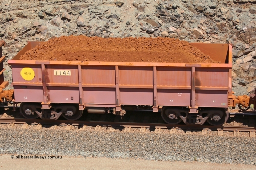 1144 160306 1567
Robe River ore waggon 1144, built by Bradken Rail Qld in March 2012, fixed coupler non-handbrake side loaded view, at the 45 km, Harding Siding on the Cape Lambert line. March 6, 2016.
Keywords: 1144;Bradken-Rail-Qld;Robe-ore-waggon;