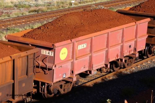 1147 210322 9739
Robe River ore waggon 1147, built by Bradken Rail Qld in May 2012, rotary coupler end non-handbrake side loaded view, at the 17 km on the Cape Lambert line, March 22, 2021
Keywords: 1147;Bradken-Rail-Qld;Robe-ore-waggon;