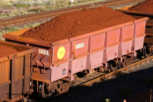 1158 210322 9731
Robe River ore waggon 1158, built by Bradken Rail Qld in May 2012, rotary coupler end non-handbrake side loaded view, at the 17 km on the Cape Lambert line, March 22, 2021
Keywords: 1158;Bradken-Rail-Qld;Robe-ore-waggon;