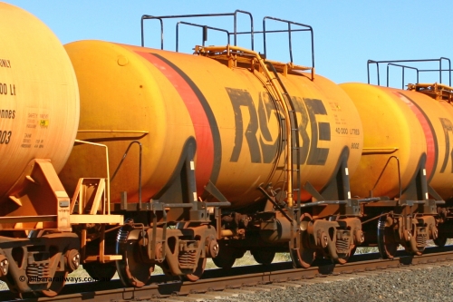 8002 060716 7200
Robe River diesel fuel tank waggon 8002 running empty on the rear of a loaded ore train, built by Comeng NSW in September 1972 with a 45,000 litre capacity, at the 71 km on the Deepdale line, Western Creek, July 16, 2006.
Keywords: 8002;Comeng-NSW;Robe-tank-waggon;