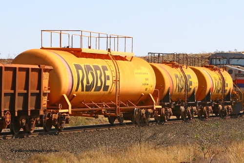 8003 070915 0885
Robe River diesel fuel tank waggons 8003, 8002 and 8001 running loaded at the front of an empty ore train. 8003 was built by Comeng NSW in March 1979 with a 100,000 litre capacity whilst 8002 and 8001 were built by the same builder with a 45,000 litre capacity in September 1972. At the 73.4 km on the Deepdale line, Western Creek, September 15, 2007.
Keywords: 8003;Comeng-NSW;Robe-tank-waggon;