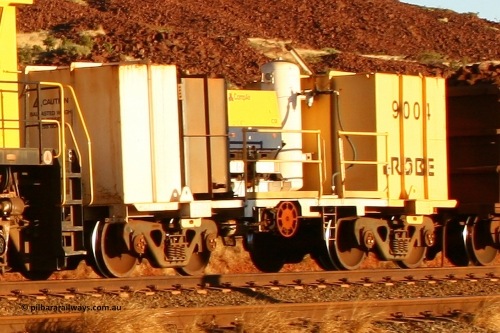 9004 060722 7639
Robe River compressor waggon 9004, a modified Nippon Sharyo Nihon built waggon with a Compair compressor, grey fuel tank and white air receiver. This style of compressor setup differs greatly from the original compressor waggons built by Nippon Sharyo Nihon. Cape Lambert yard July 22, 2006.
Keywords: 9004;robe-compressor-waggon;