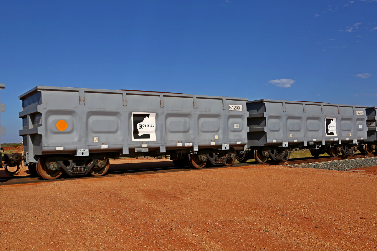 151203 9598
At the 47.442 km grade crossing on the Roy Hill line, adjacent to FMG's Barker ballast siding, loaded Roy Hill waggon pair GA type class leaders GA 2001 - GA 2002. Built in China by CSR Yangtze as an CCK138 model ore waggon. December 3, 2015.
Keywords: GA-type;GA2001-GA2002;CSR-Yangtze;CCK138