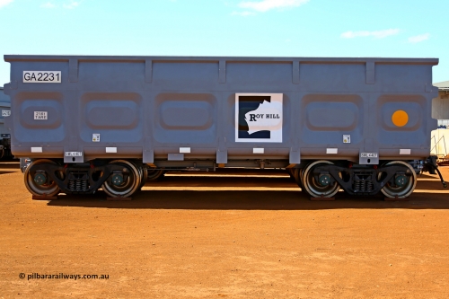 150314 7762
Wedgefield, following the delivery of Roy Hill's 1196 new GA type CCK138 model waggons, they were stored in several site whilst awaiting for enough track to be laid to allow delivery onto rail. GA2231 side view showing the logo and details, the yellow circle designates the rotary coupler end. March 14. 2015.
Keywords: GA-type;GA2231;CSR-Yangtze;CCK138;