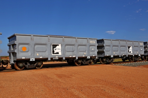 151203 9598
At the 47.442 km grade crossing on the Roy Hill line, adjacent to FMG's Barker ballast siding, loaded Roy Hill waggon pair GA type class leaders GA 2001 - GA 2002. Built in China by CSR Yangtze as an CCK138 model ore waggon. December 3, 2015.
Keywords: GA-type;GA2001-GA2002;CSR-Yangtze;CCK138;