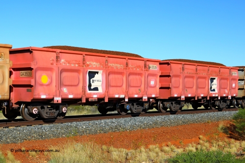 250501 0374
At the 88.448 km, just south of HPPL crossing loop on the Roy Hill line, loaded Roy Hill waggon pair GA 3539 - GA 3540, built in China by CRRC Yangtze as an CCK138 model ore waggon in Breast Cancer Awareness pink livery. May 1, 2025.
Keywords: GA-type;GA3539-GA3540;CRRC-Yangtze;CCK138;