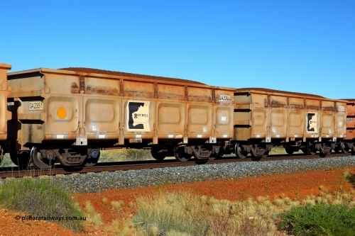 250501 0403
At the 88.448 km, just south of HPPL crossing loop on the Roy Hill line, loaded Roy Hill waggon pair GA 2351 - GA 2352, built in China by CSR Yangtze as an CCK138 model ore waggon. May 1, 2025.
Keywords: GA-type;GA2351-GA2352;CSR-Yangtze;CCK138;