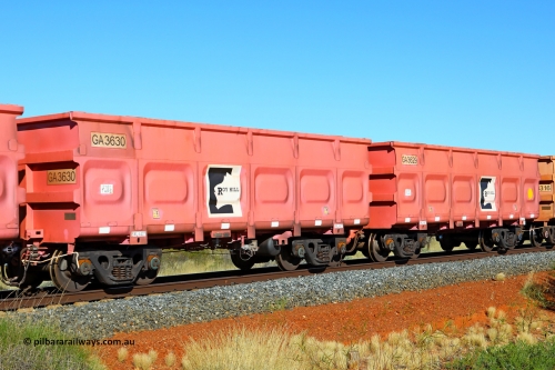 250501 0446
At the 88.448 km, just south of HPPL crossing loop on the Roy Hill line, empty Roy Hill waggon pair GA 3629 - GA 3630, built in China by CRRC Yangtze as an CCK138 model ore waggon in Breast Cancer Awareness pink livery. May 1, 2025.
Keywords: GA-type;GA3629-GA3630;CRRC-Yangtze;CCK138;
