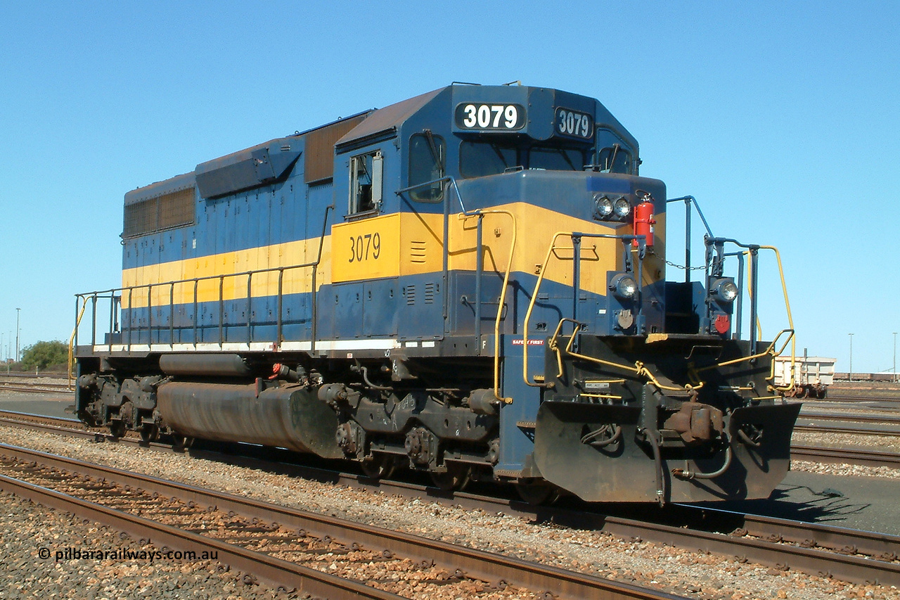3079 roster rhs 040627 134646
Nelson Point BHP Billiton SD40 unit 3079 serial 31542 originally Southern Pacific SD40 SP 8461 and still in former owner IC&E blue and yellow has been fitted with some crew amenities like cab air-con, radios and microwave to allow it to operate as a yard pilot, seen here in the yard on the 27th of June 2004.
Keywords: 3079;EMD;SD40;31542/7861-52;SP8461;