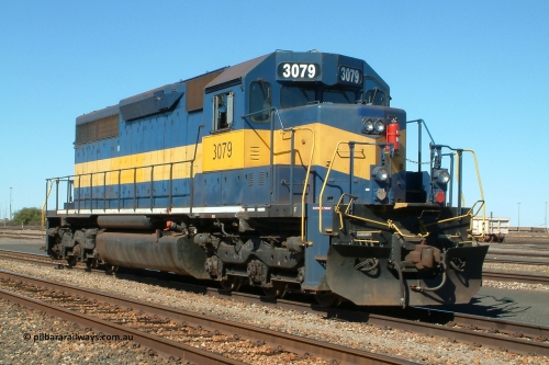 3079 roster rhs 040627 134646
Nelson Point BHP Billiton SD40 unit 3079 serial 31542 originally Southern Pacific SD40 SP 8461 and still in former owner IC&E blue and yellow has been fitted with some crew amenities like cab air-con, radios and microwave to allow it to operate as a yard pilot, seen here in the yard on the 27th of June 2004.
Keywords: 3079;EMD;SD40;31542/7861-52;SP8461;