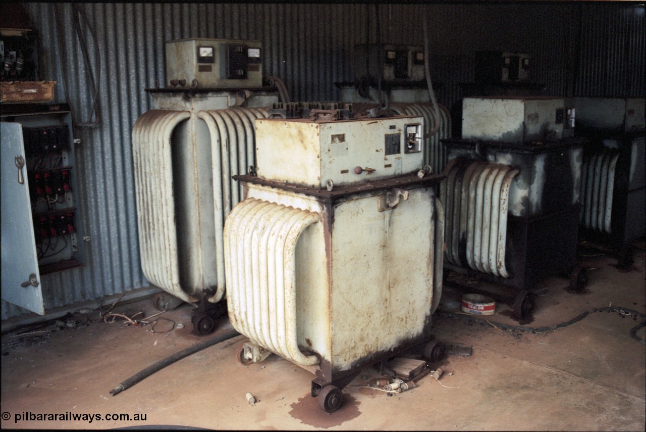 194-24
Wittenoom, Colonial Mine, asbestos mining remains, battery charging transformers in locomotive workshops.
