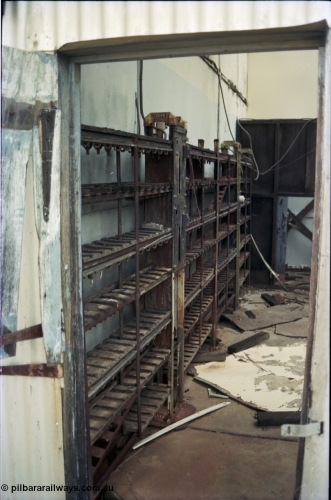 194-12
Wittenoom Gorge, Colonial Mine, asbestos mining remains, view of the CEAG cap lamp charging racks.
