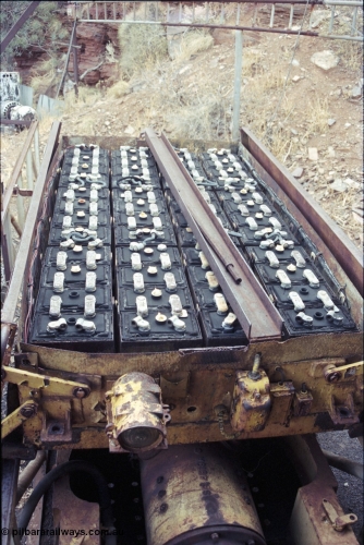 194-22
Wittenoom, Colonial Mine, asbestos mining remains, detail view of a Mancha battery module with the covers in the open position shows the full forty eight 2 volt cells to power the 80 volt locomotives.

