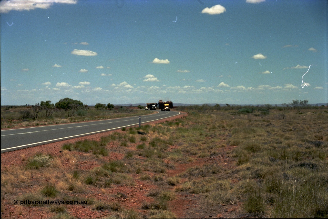 195-03
Great Northern Highway, oversize load of dump truck and dump body.
