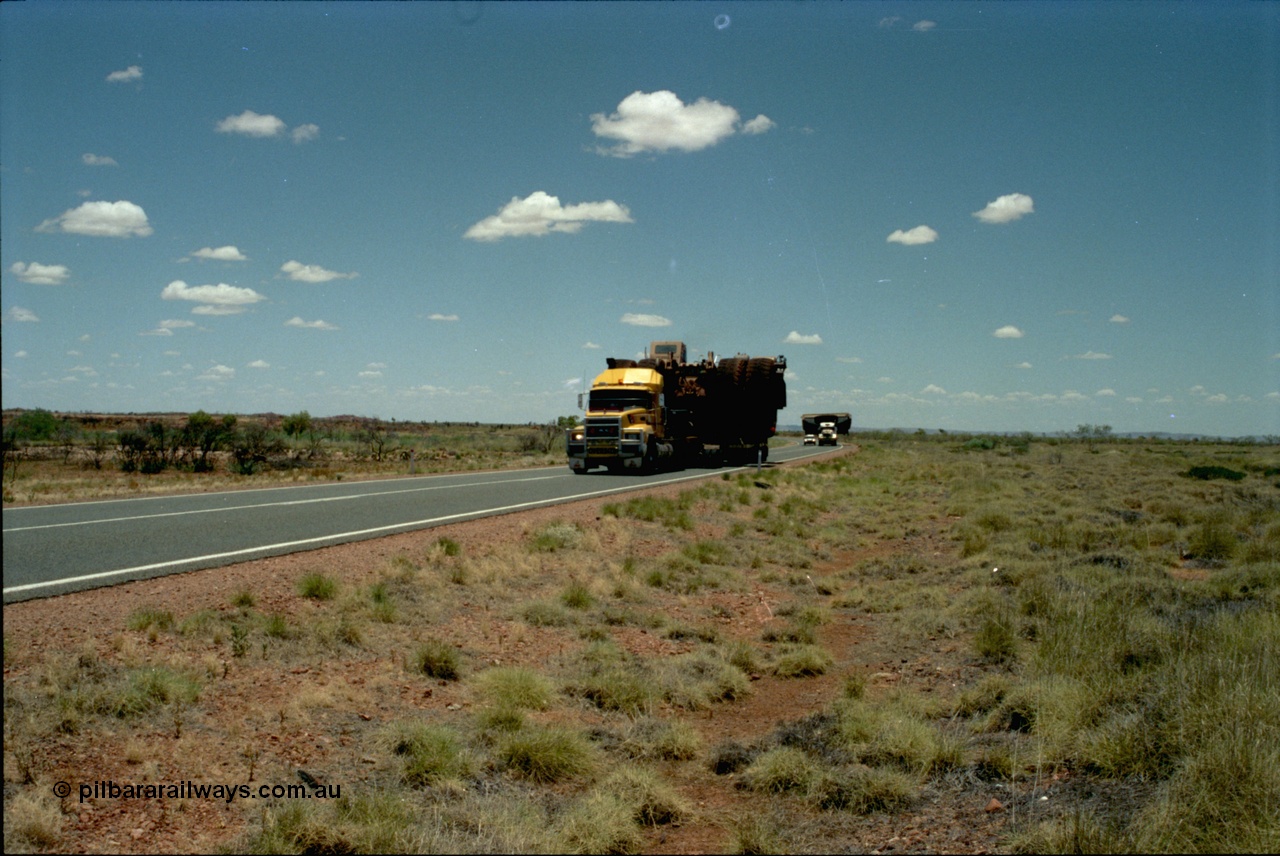 195-04
Great Northern Highway, oversize load of dump truck and dump body.
