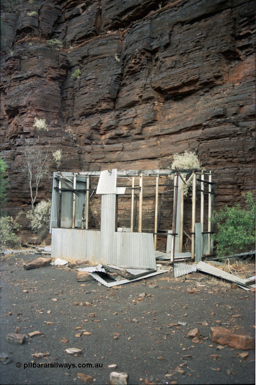 195-32
Wittenoom, West Gorge, Australian Blue Asbestos or ABA Colonial Mine, remains of a building on the adit level adjacent to no. 30.
