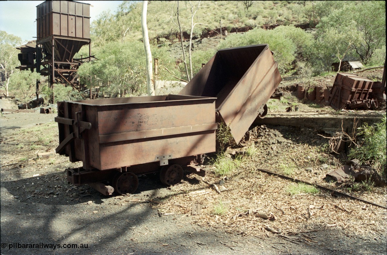 196-32
Wittenoom Gorge, Gorge Mine area, asbestos mining remains, side tipping ore waggons, one can be seen in the background in the tipped position.
