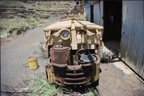 197-31
Wittenoom, Colonial Mine, front view of Mancha battery locomotive, view of drivers seat, brake wheel, controller and battery module.
Keywords: Mancha;