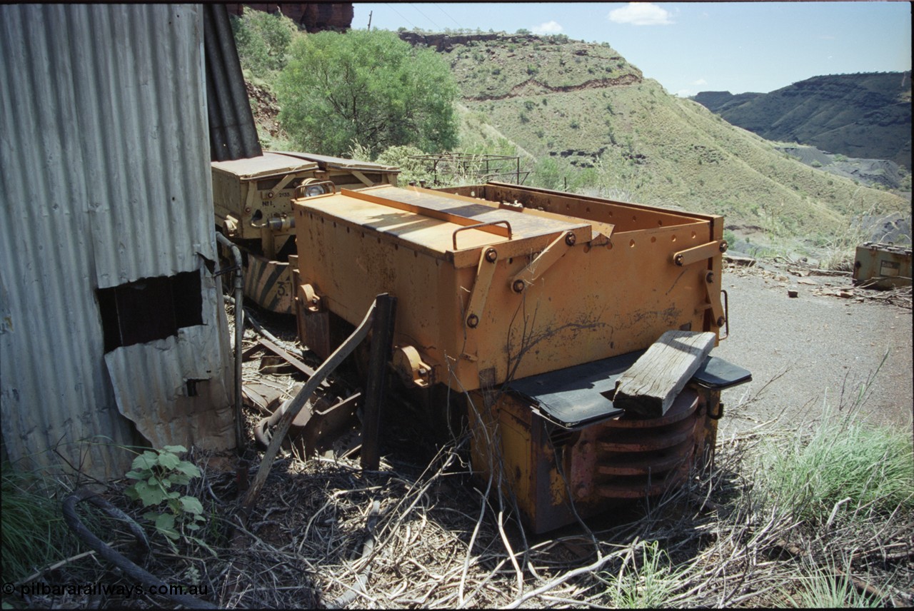 198-01
Wittenoom, Colonial Mine, asbestos mining remains, rear view of battery box and battery locomotive GEMCO Hauler serial 12304-05/10/65, motor H.P. 2/11, volts 80, drawbar pull (lbs.) 1250 built by George Moss Pty Ltd Leederville, WA.
Keywords: Gemco;George-Moss;12304-05/10/65;