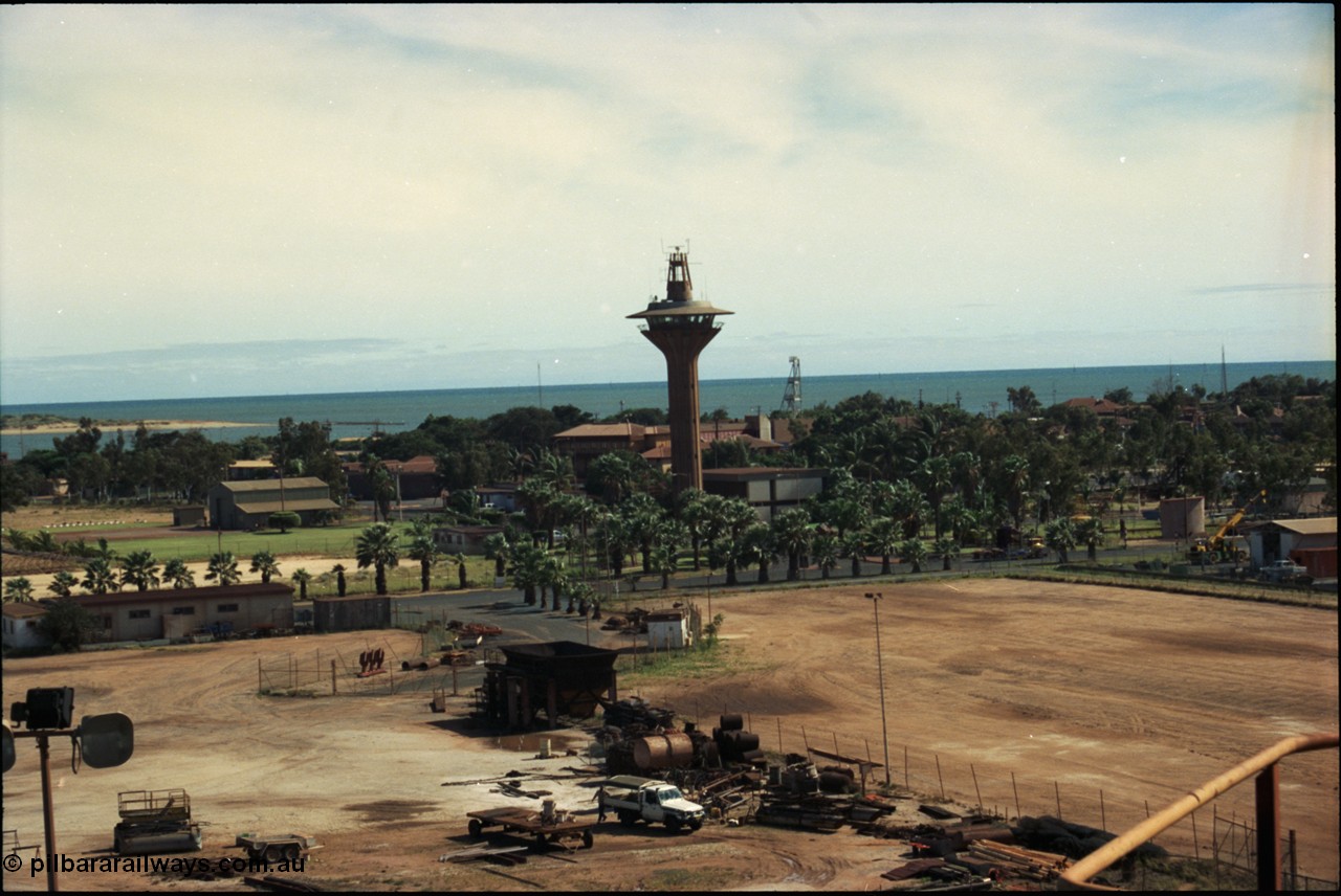 198-25
Port Hedland Port, view of Port Control Tower, grassed area with shed is for helicopter operator, the Esplanade Hotel can also be seen along with the lookout tower behind the visitors centre.
