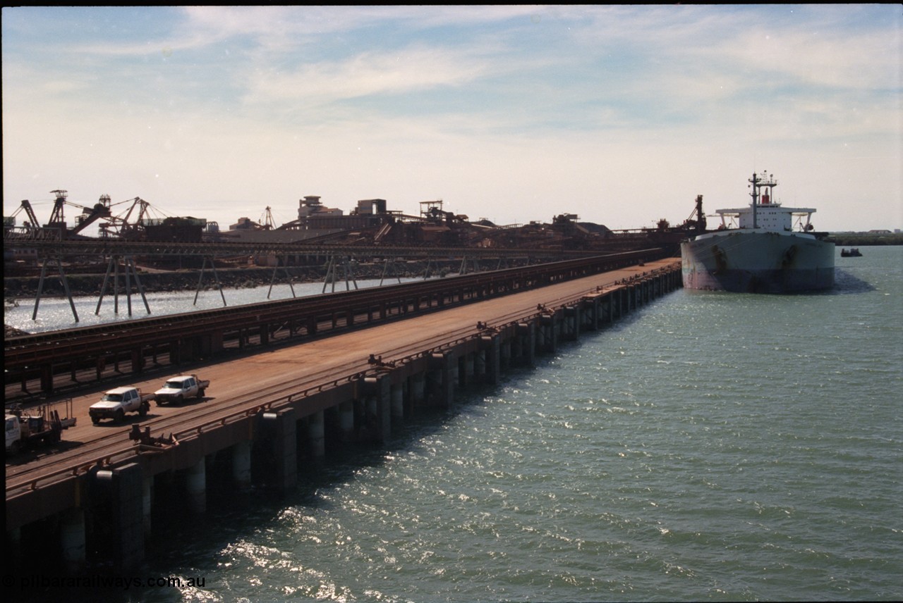 198-36
Port Hedland Port, BHP Nelson Point view of A Berth looking towards Berth B with vessel being loaded on B Berth by Shiploader One.
