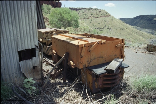 198-02
Wittenoom, Colonial Mine, asbestos mining remains, rear view of battery box and battery locomotive GEMCO Hauler serial 12304-05/10/65, motor H.P. 2/11, volts 80, drawbar pull (lbs.) 1250 built by George Moss Pty Ltd Leederville, WA.
Keywords: Gemco;George-Moss;12304-05/10/65;
