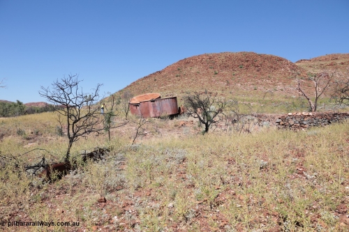 140517-4309
Eginbah Siding area, of the Marble Bar railway, former locomotive watering stop alongside the Talga River (closed in 1951), view of the line formation block fill and tanks on collapsed stands. [url=https://goo.gl/maps/fVgGW2ov6Tu]Location here[/url].
