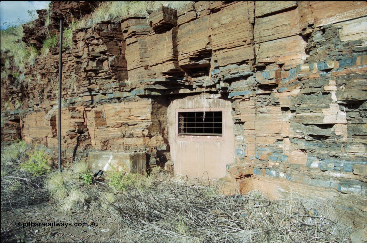203-37
Yampire Gorge, remains of asbestos mining, sealed up drive entry No. 7.
