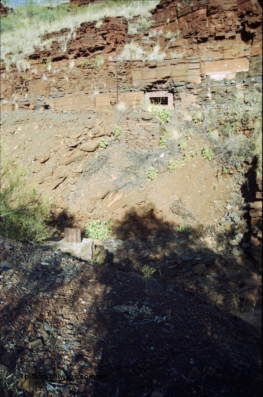 204-01
Yampire Gorge, remains of asbestos mining, view across creek to sealed up drive entry No. 7.
