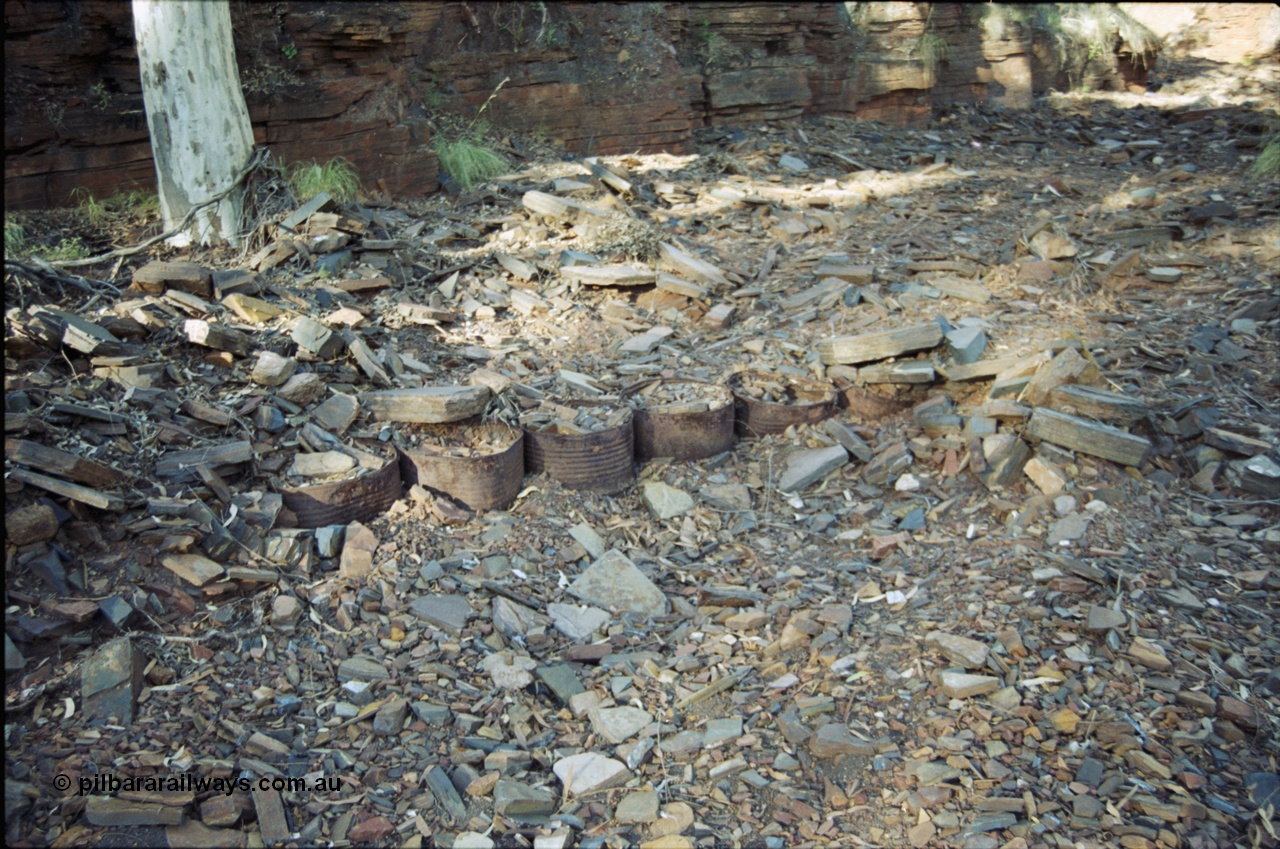 204-05
Yampire Gorge, remains of asbestos mining, how foundations were made, buried 44 gallon drums filled with rock.
