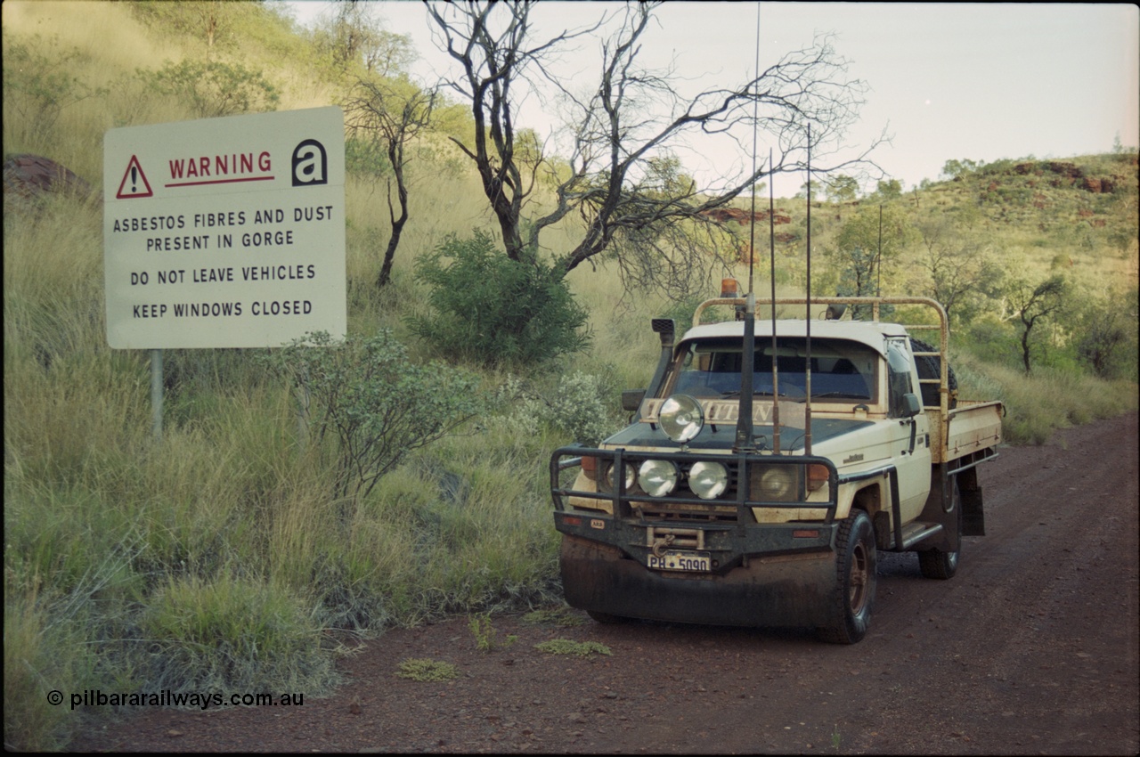 204-11
Yampire Gorge, road out of the gorge area with warning sign, Toyota HJ75 Landcruiser ute, PH 5090.
