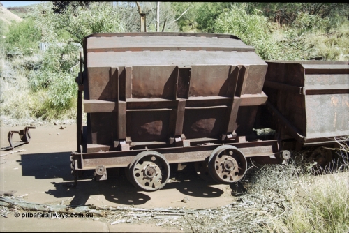 204-22
Wittenoom Gorge Mine, remains of asbestos mining, underground tipping ore cars, detail view of wheels and underside of car.
