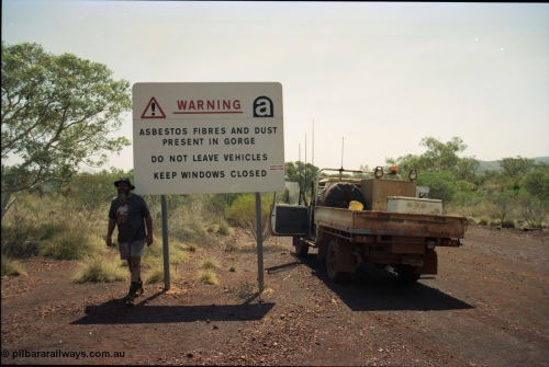 205-27
Yampire Gorge, asbestos sign, Pope Searle getting some fibre.

