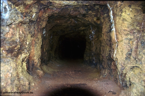 205-32
Koodaideri, drive cut into side, early exploration, drive was dug by Umberto Favero, a long time Hancock employee and worker and then caretaker of the Wittenoom mine site and settlement.
