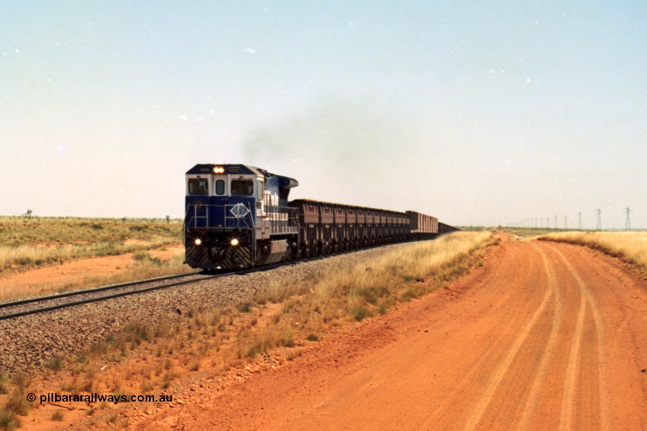 206-27
An empty train on the Yarrie (former Goldsworthy) line behind BHP 5633 'Hephaestus' built new in 1988 by Goninan as a GE CM39-8 model, serial 5831-12 / 88-082. The four CM39-8 units were upgraded to CM40-8 units following overhauls and finally scrapped in January 2016.
Keywords: 5633;Goninan;GE;CM39-8;5831-12/88-082;