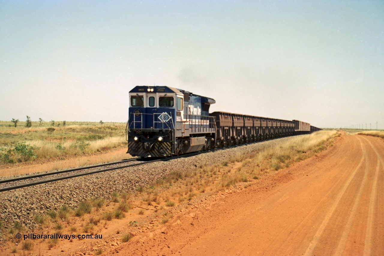 206-28
An empty train on the Yarrie (former Goldsworthy) line behind BHP 5633 'Hephaestus' built new in 1988 by Goninan as a GE CM39-8 model, serial 5831-12 / 88-082. The four CM39-8 units were upgraded to CM40-8 units following overhauls and finally scrapped in January 2016.
Keywords: 5633;Goninan;GE;CM39-8;5831-12/88-082;