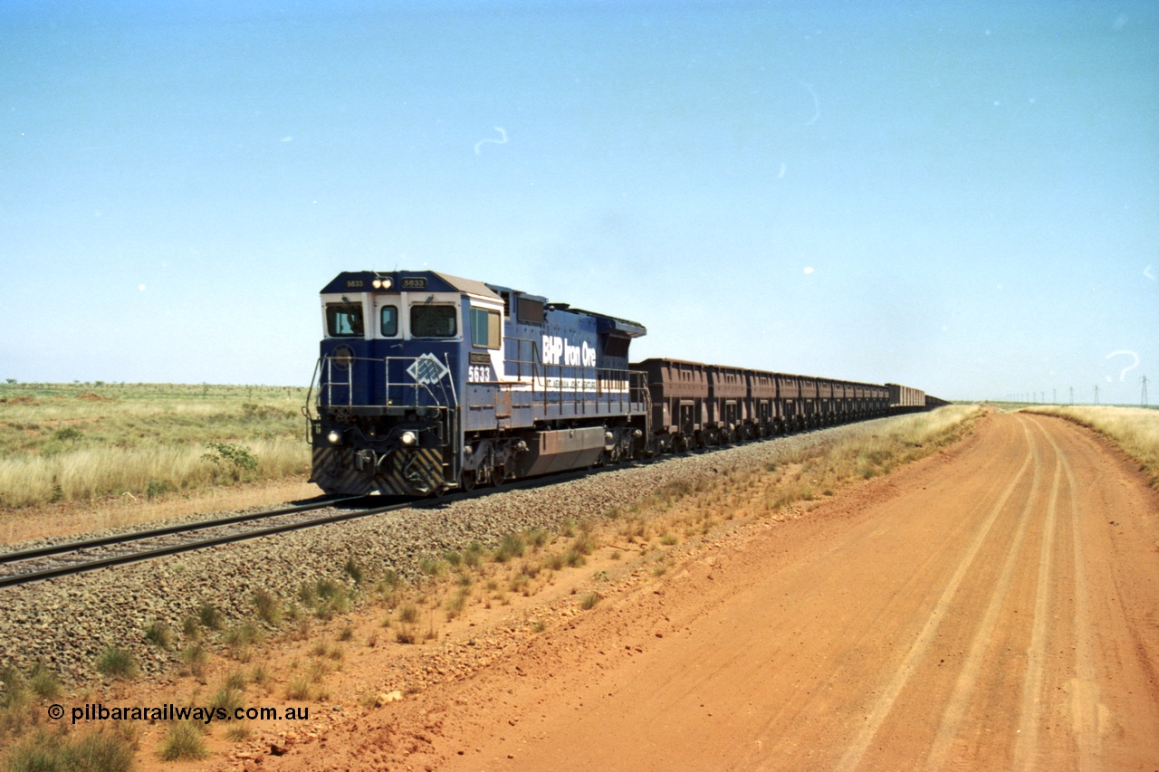 206-29
An empty train on the Yarrie (former Goldsworthy) line behind BHP 5633 'Hephaestus' built new in 1988 by Goninan as a GE CM39-8 model, serial 5831-12 / 88-082. The four CM39-8 units were upgraded to CM40-8 units following overhauls and finally scrapped in January 2016.
Keywords: 5633;Goninan;GE;CM39-8;5831-12/88-082;