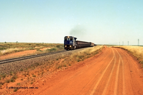 206-26
An empty train on the Yarrie (former Goldsworthy) line behind BHP 5633 'Hephaestus' built new in 1988 by Goninan as a GE CM39-8 model, serial 5831-12 / 88-082. The four CM39-8 units were upgraded to CM40-8 units following overhauls and finally scrapped in January 2016.
Keywords: 5633;Goninan;GE;CM39-8;5831-12/88-082;