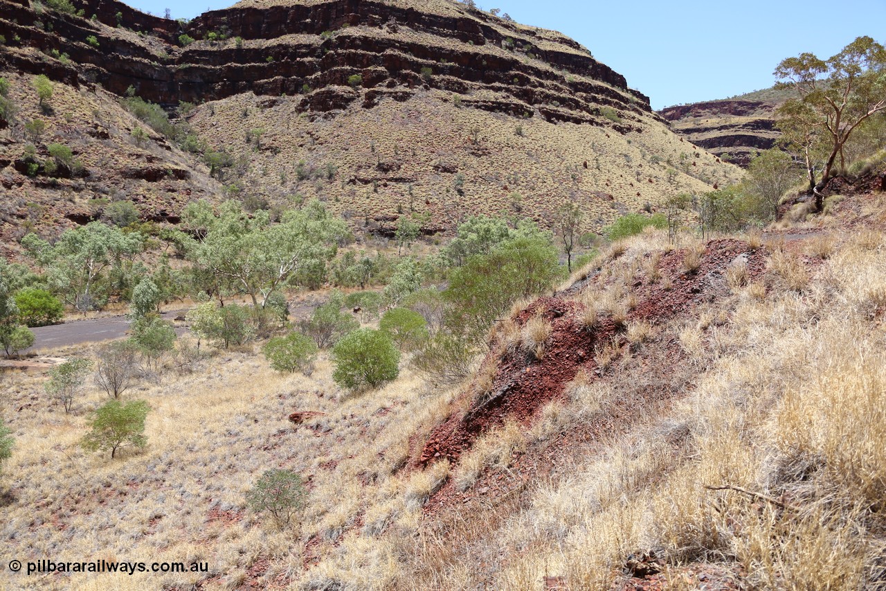 160101 9780
Wittenoom Gorge, Gorge Mine area, asbestos mining remains, site of milling building on left, access ramp to mine adits on the right. [url=https://goo.gl/maps/sbEo62sHhRL2]Geodata[/url].
