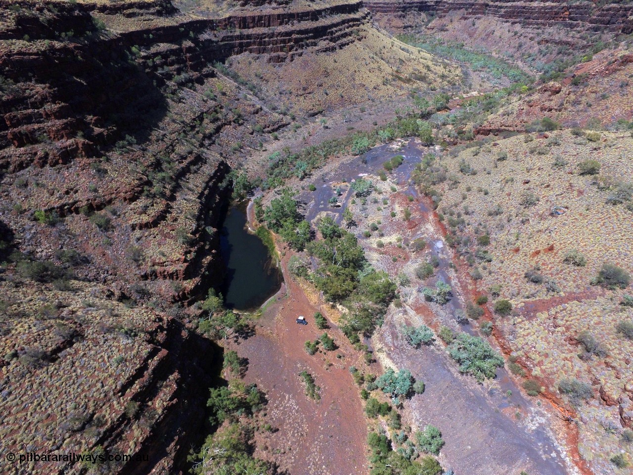 160101 DJI 0013
Wittenoom Gorge, view from above the Gorge Mine area and pool, looking south west, campers at pool, the track continues on for a little further than here, and then foot access can be gained into gorge in Karijini National Park. [url=https://goo.gl/maps/gL4iyihuq5BNSAWS9]Geodata[/url].
