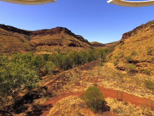 160101 DJI 0008
Wittenoom Gorge, at the end of Bolitho Rd neat the former settlement looking south west towards the Gorge Mine, power station was located on cut to the left above the tree line. [url=https://goo.gl/maps/AE2xJrLCw5Lwubnc6]Geodata[/url].
